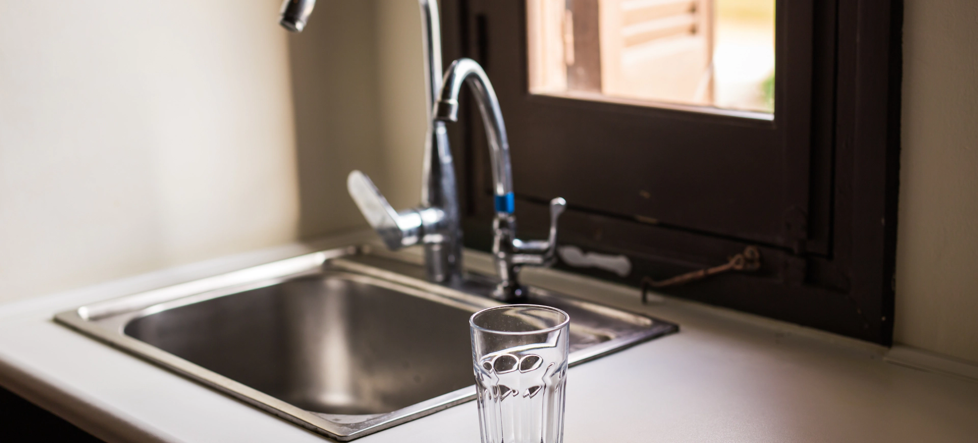 water in faucet sink